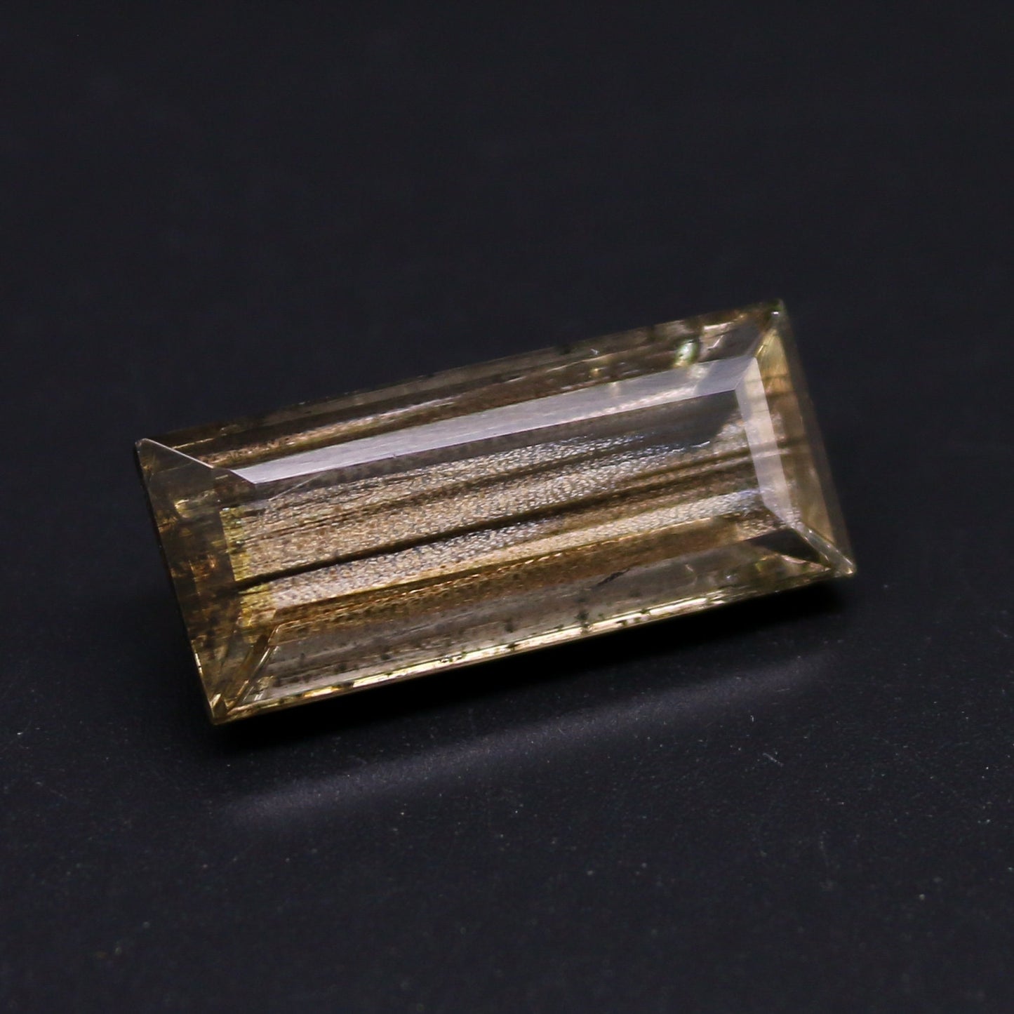 Natural Rare Gold Sheen Scapolite 8.68 Carat 20x8.5 MM Baguette Shape Faceted Gemstone