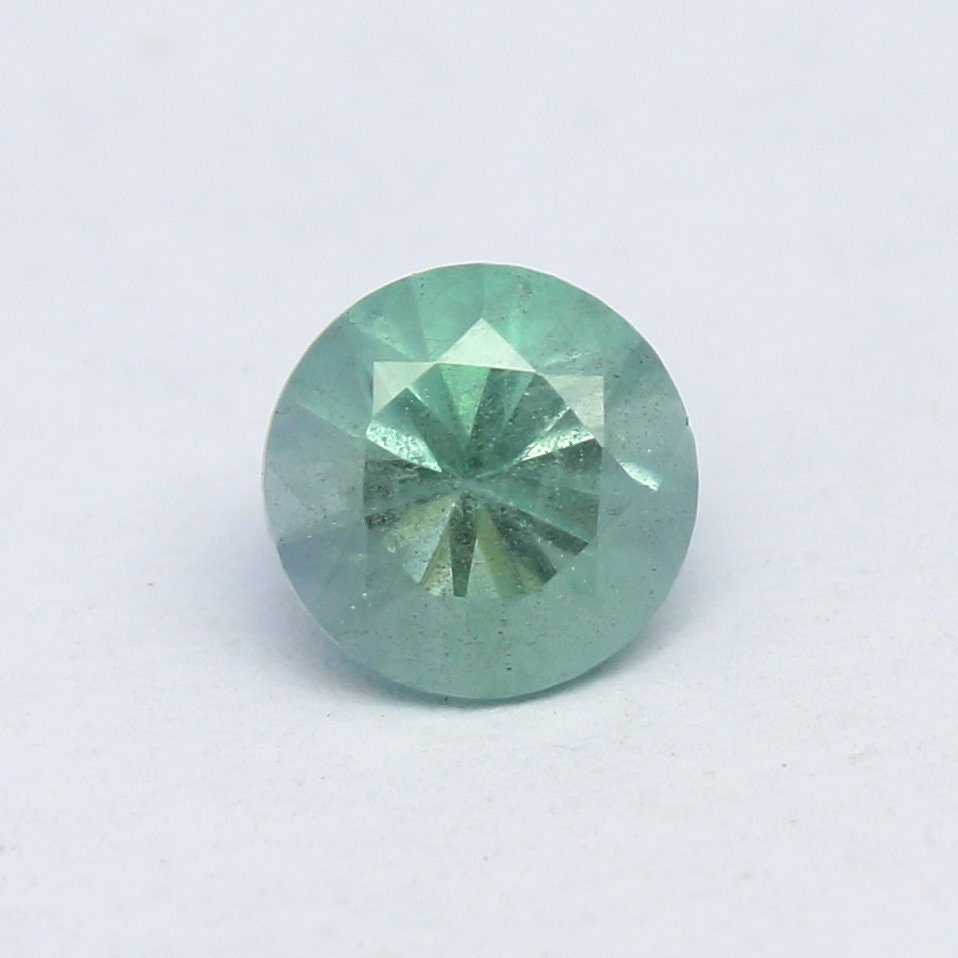 Natural Rare Kornerupine 0.67 Carat 5.4x5.4 MM Round Shape Faceted Gemstone