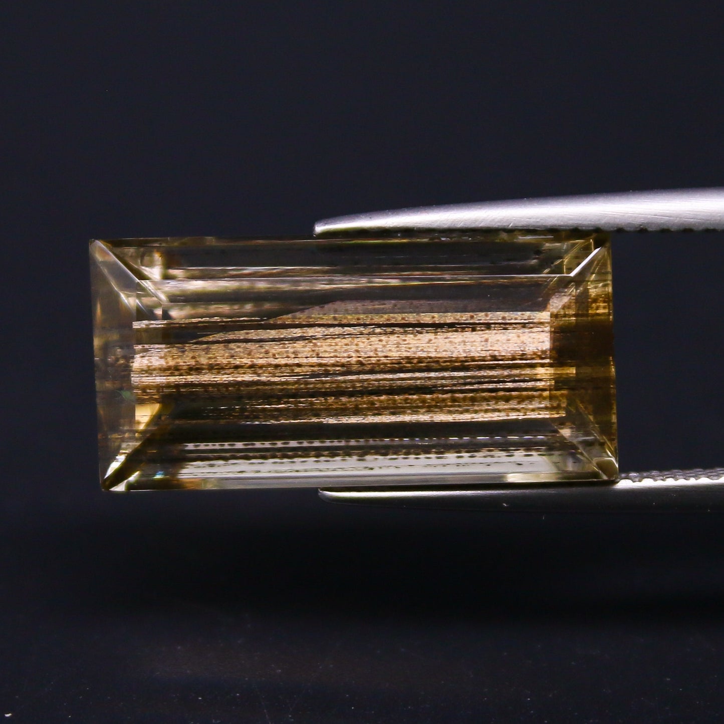 Natural Rare Gold Sheen Scapolite 11.76 Carat 21.1x9.8 MM Baguette Shape Faceted Gemstone