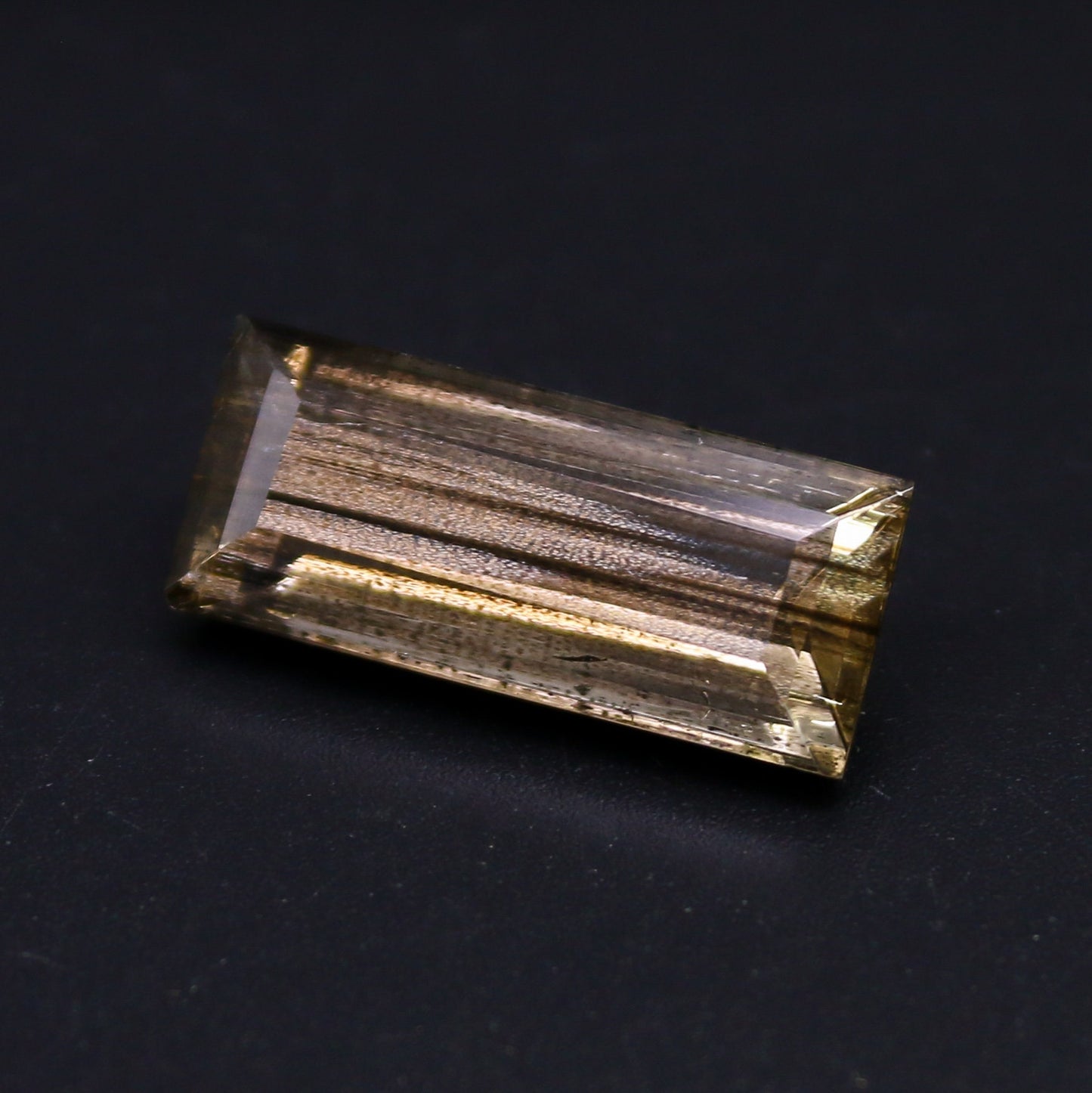 Natural Rare Gold Sheen Scapolite 8.68 Carat 20x8.5 MM Baguette Shape Faceted Gemstone