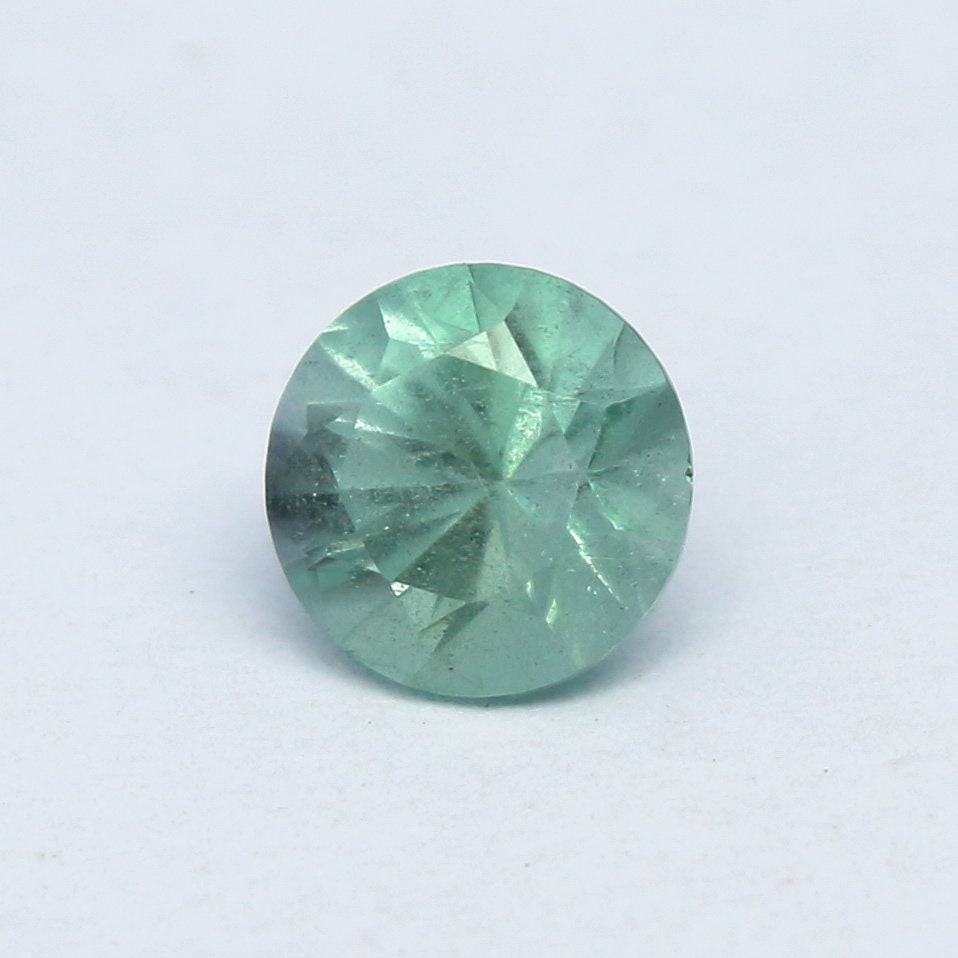 Natural Rare Kornerupine 0.67 Carat 5.4x5.4 MM Round Shape Faceted Gemstone